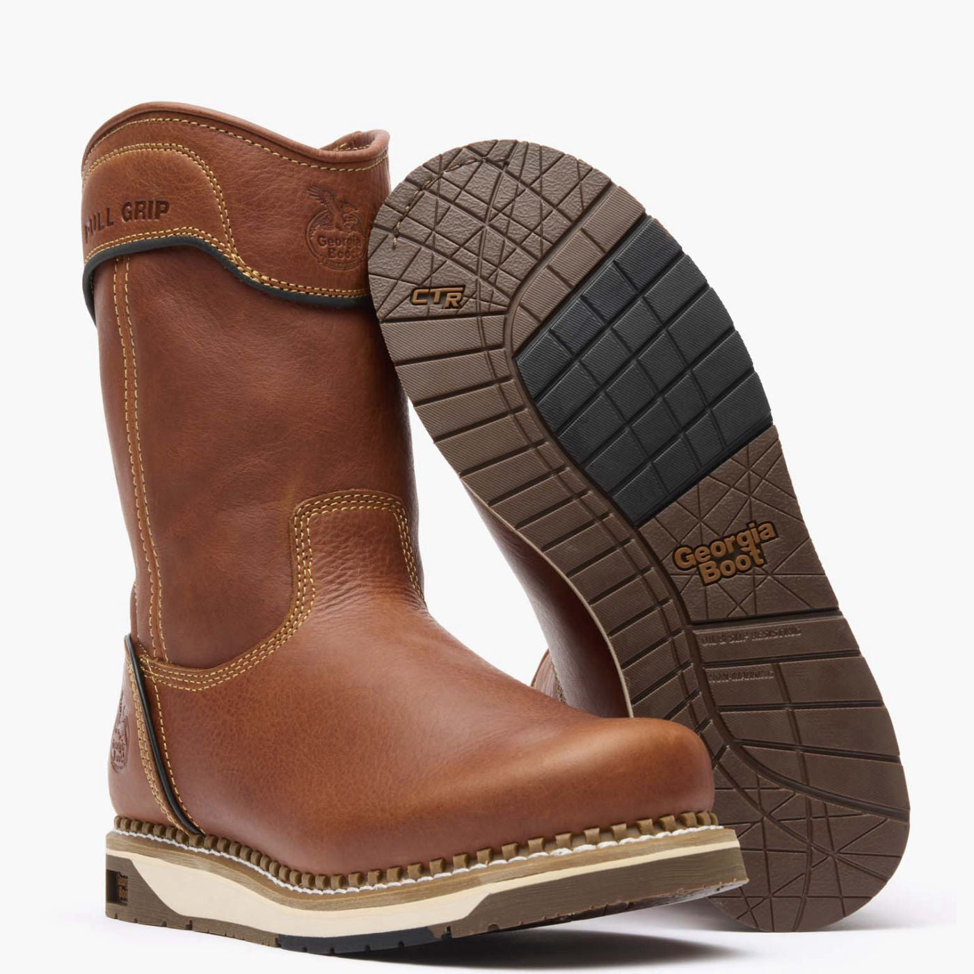 Brown leather boot with a close-up of the sole on a white background