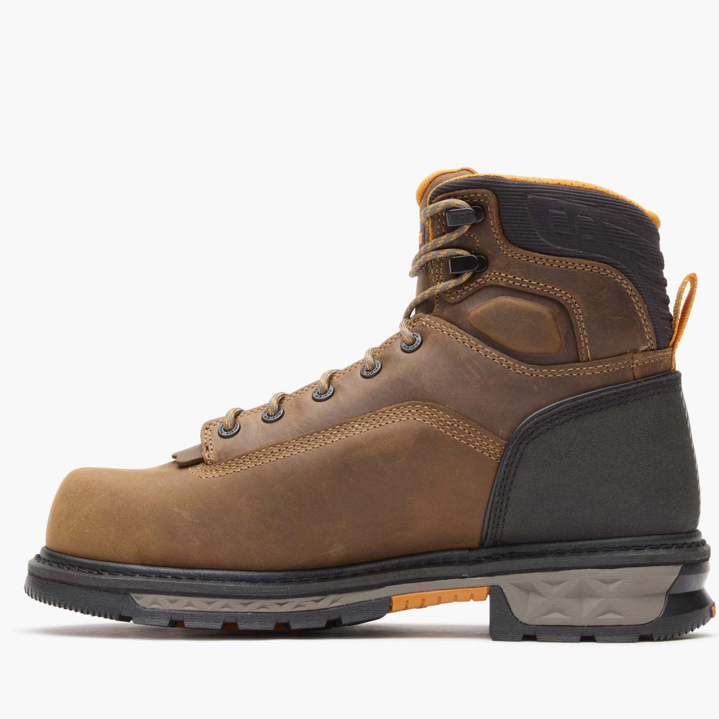 Brown leather boot with black sole on a white background