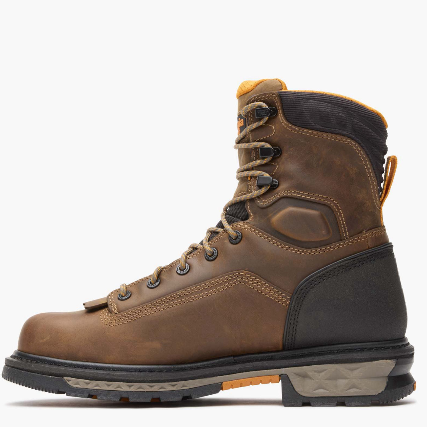 Brown leather boot with black sole on a white background