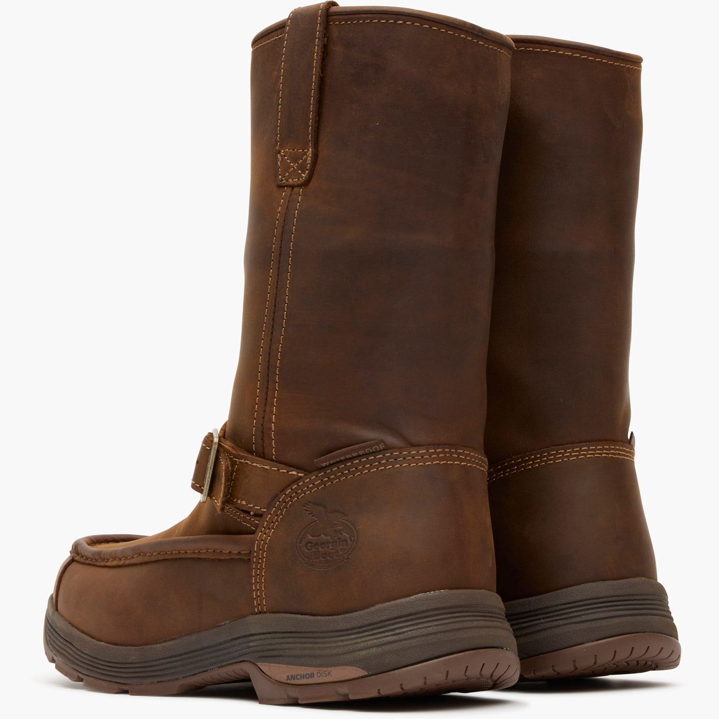 Pair of brown leather boots on a white background