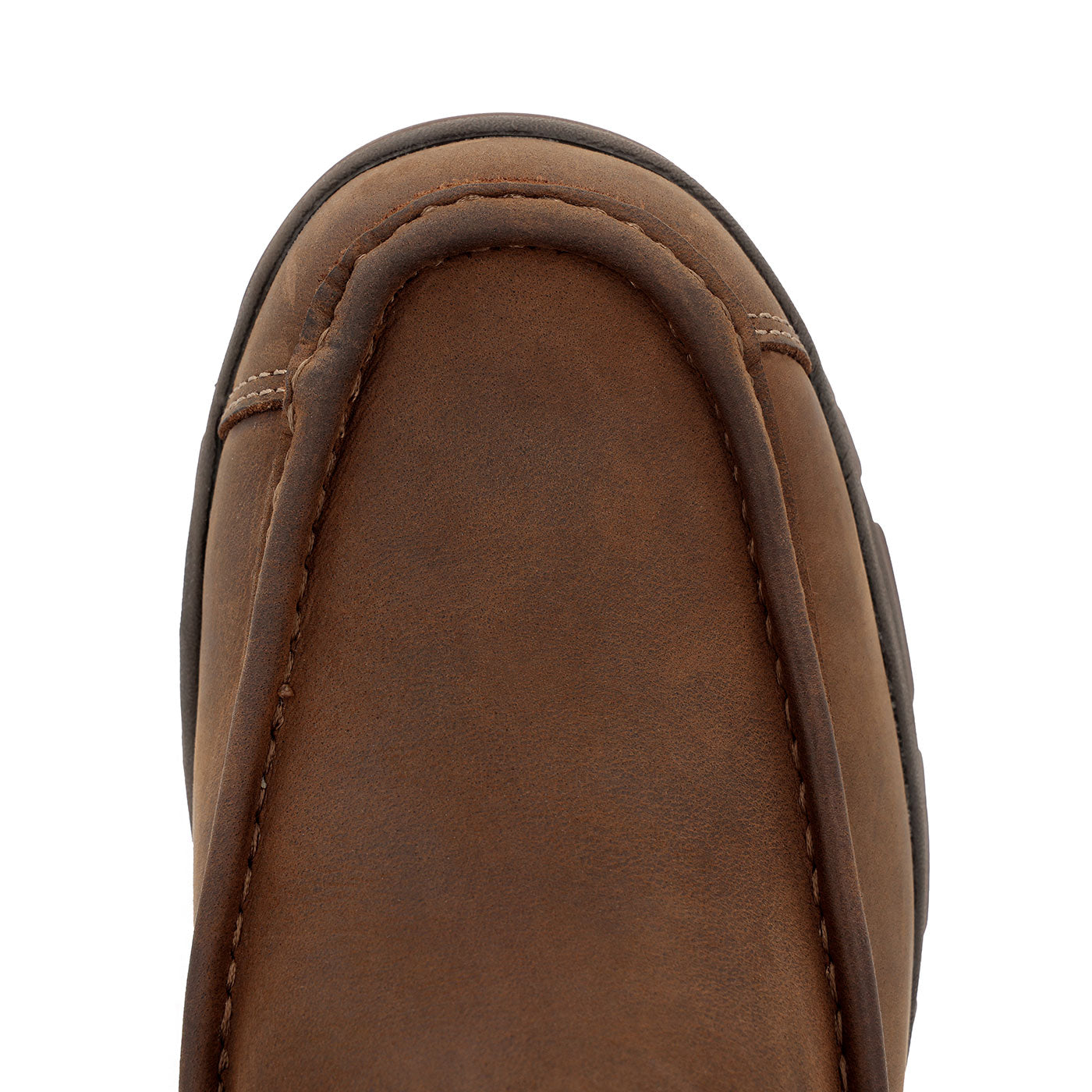 Close-up of a brown leather shoe sole on a white background