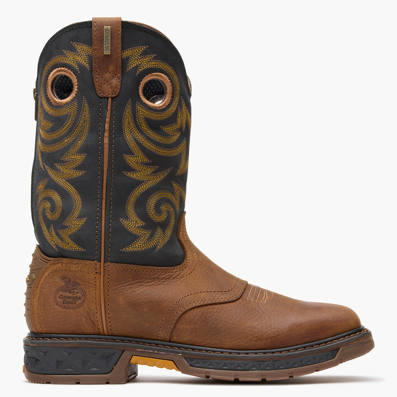Brown cowboy boot with intricate design on a white background
